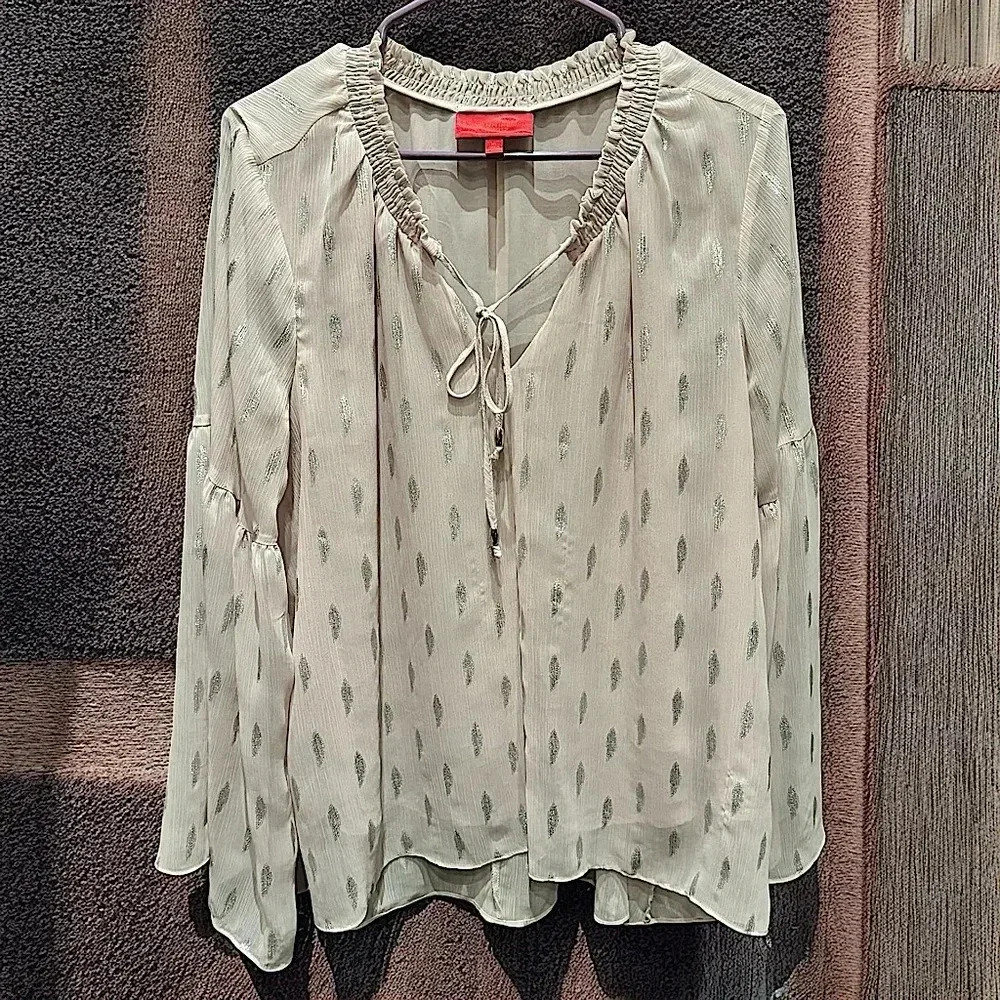 Jennifer Lopez Cream Blouse with Green Pattern